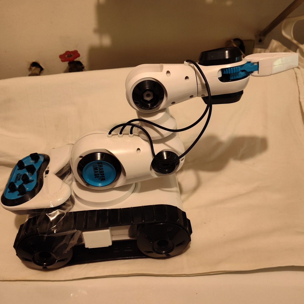Sharper Image White and Black Robotic Arm with Blue Accents